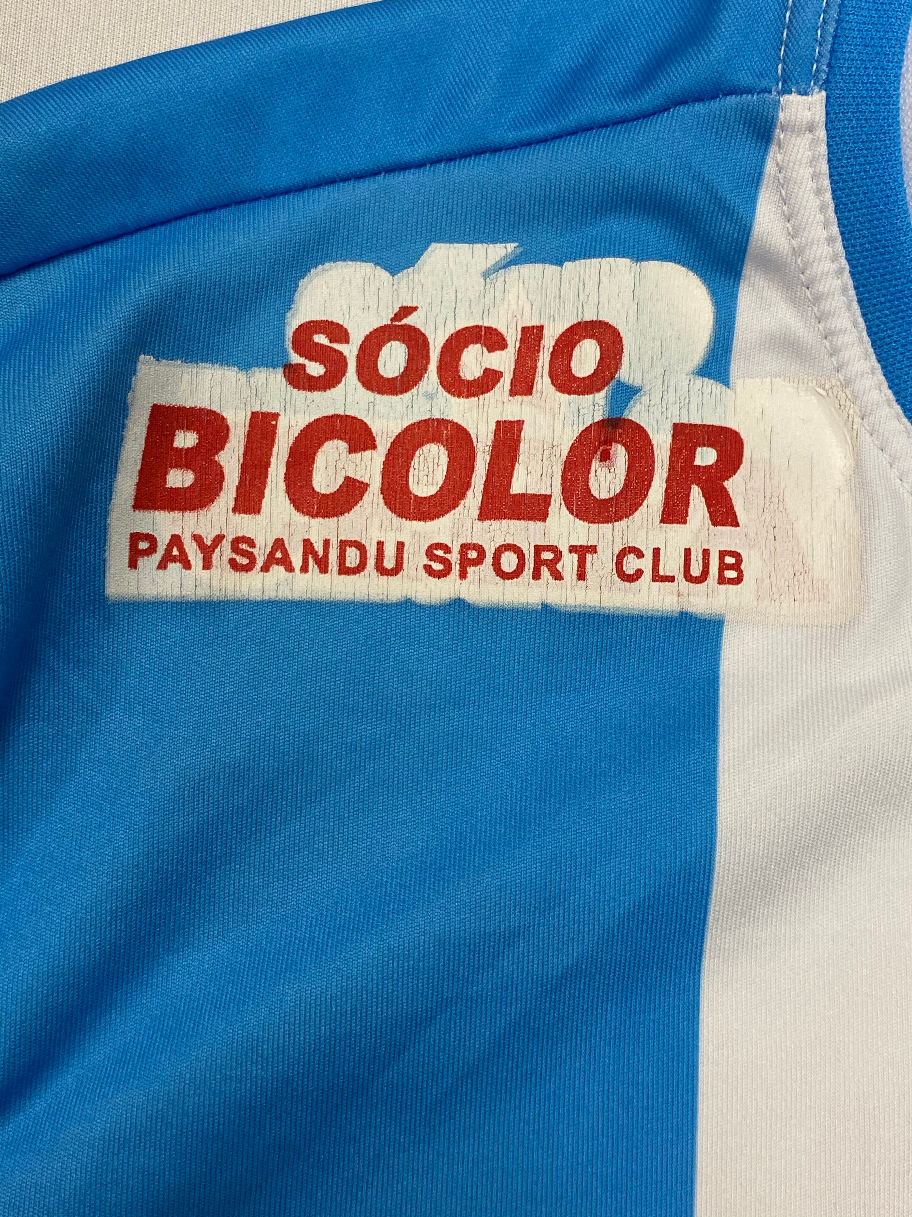 2013 Paysandú *Problema del jugador* Camiseta local L/S #4 (XL) 8.5/10